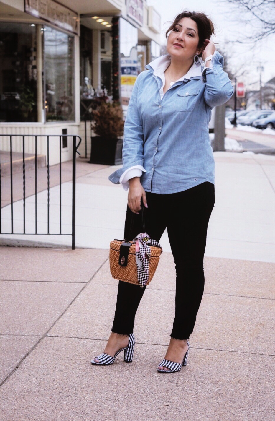 How to layer a chambray shirt over a white oxford for a chic preppy look.
